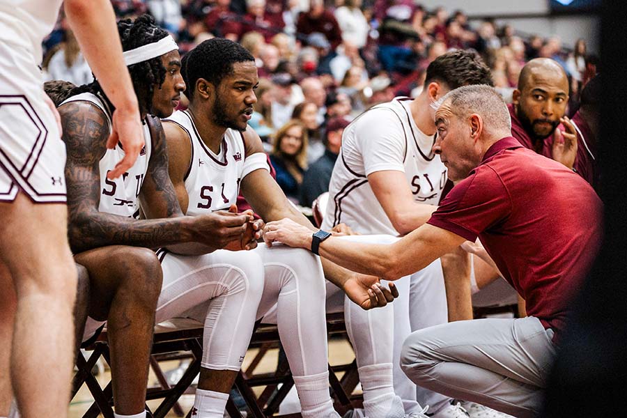 Coach Speaking to Players